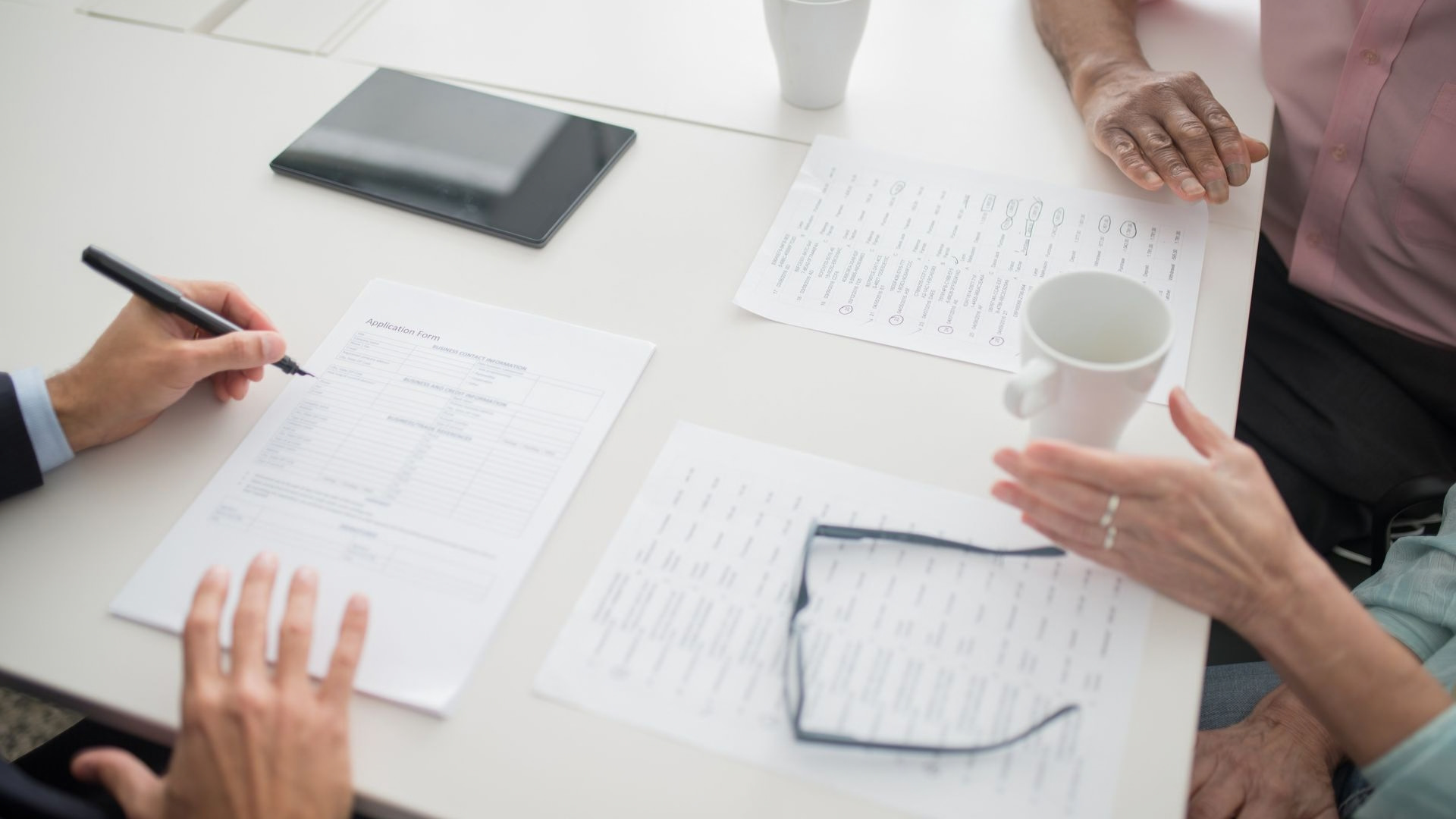 Restaurant cash flow documents being reviewed for a BC business purchase